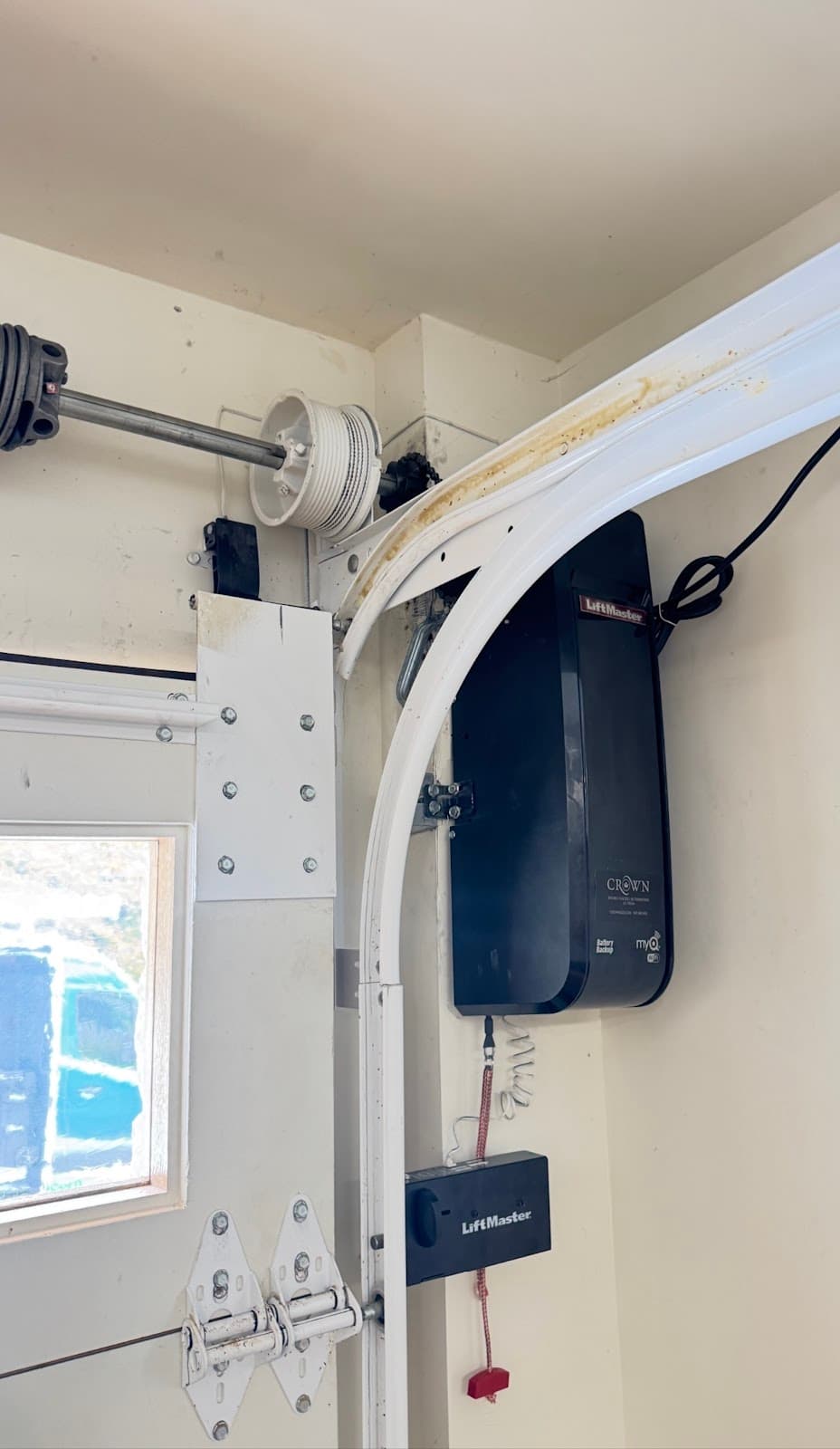 LiftMaster wall-mount opener and spring system after replacement